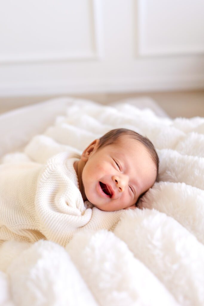 sleeping newborn captured in stunning detail by a luxury studio newborn photographer serving Huntington Beach and Orange County