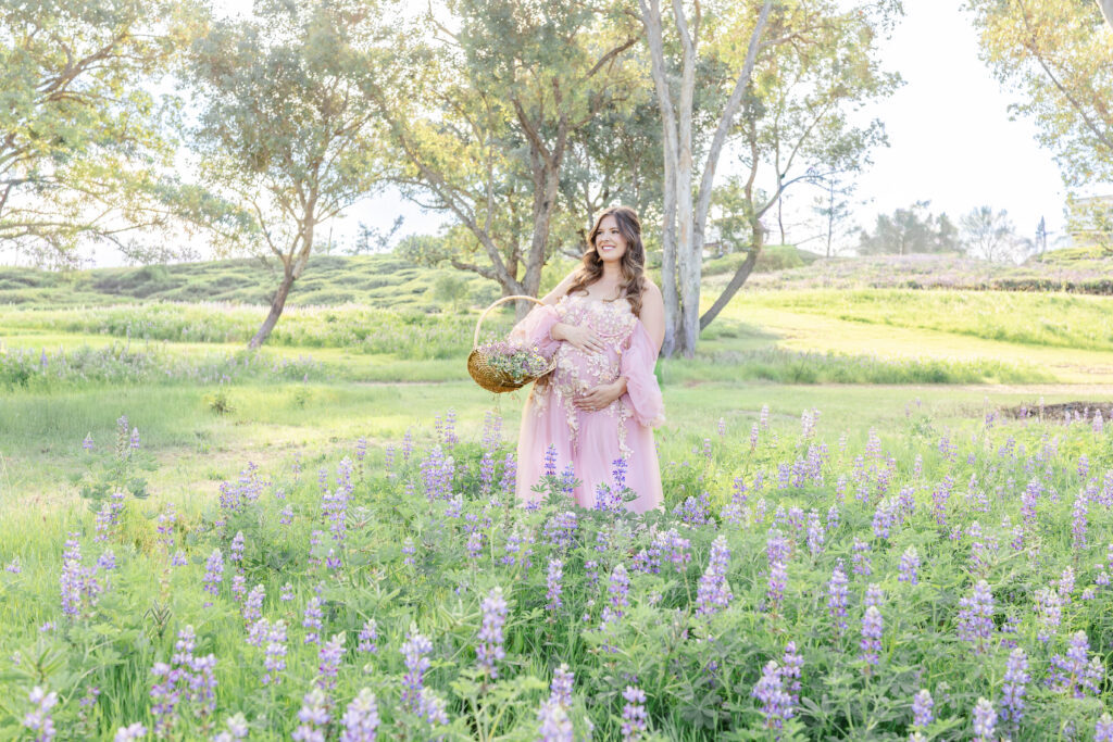 Newport beach maternity session mom belly lupines for her maternity session with Erin Custer Photo 