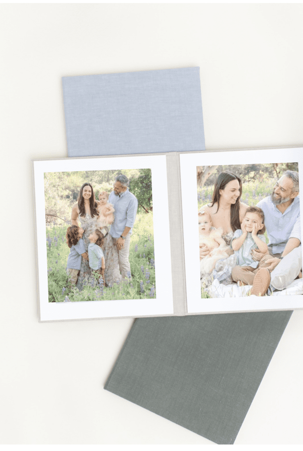 Linen-wrapped heirloom album styled with a smash cake session by a Southern California motherhood photographer