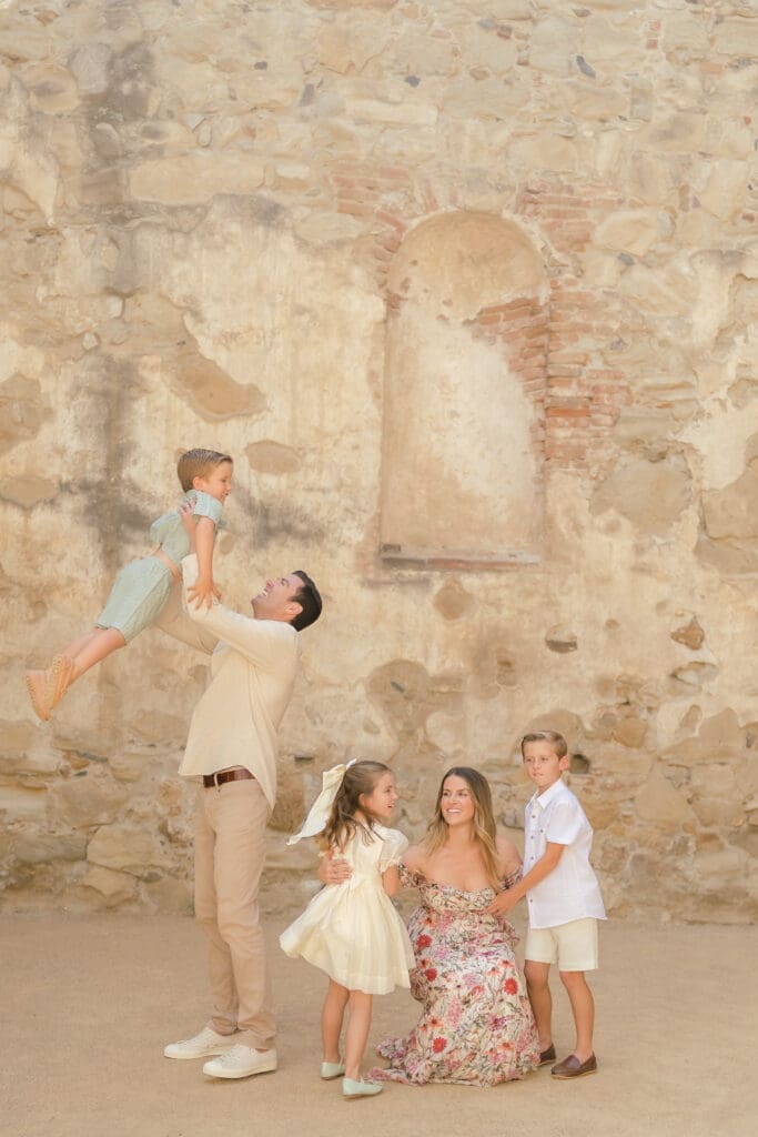 Mom and kids laughing san juan capistrano mission