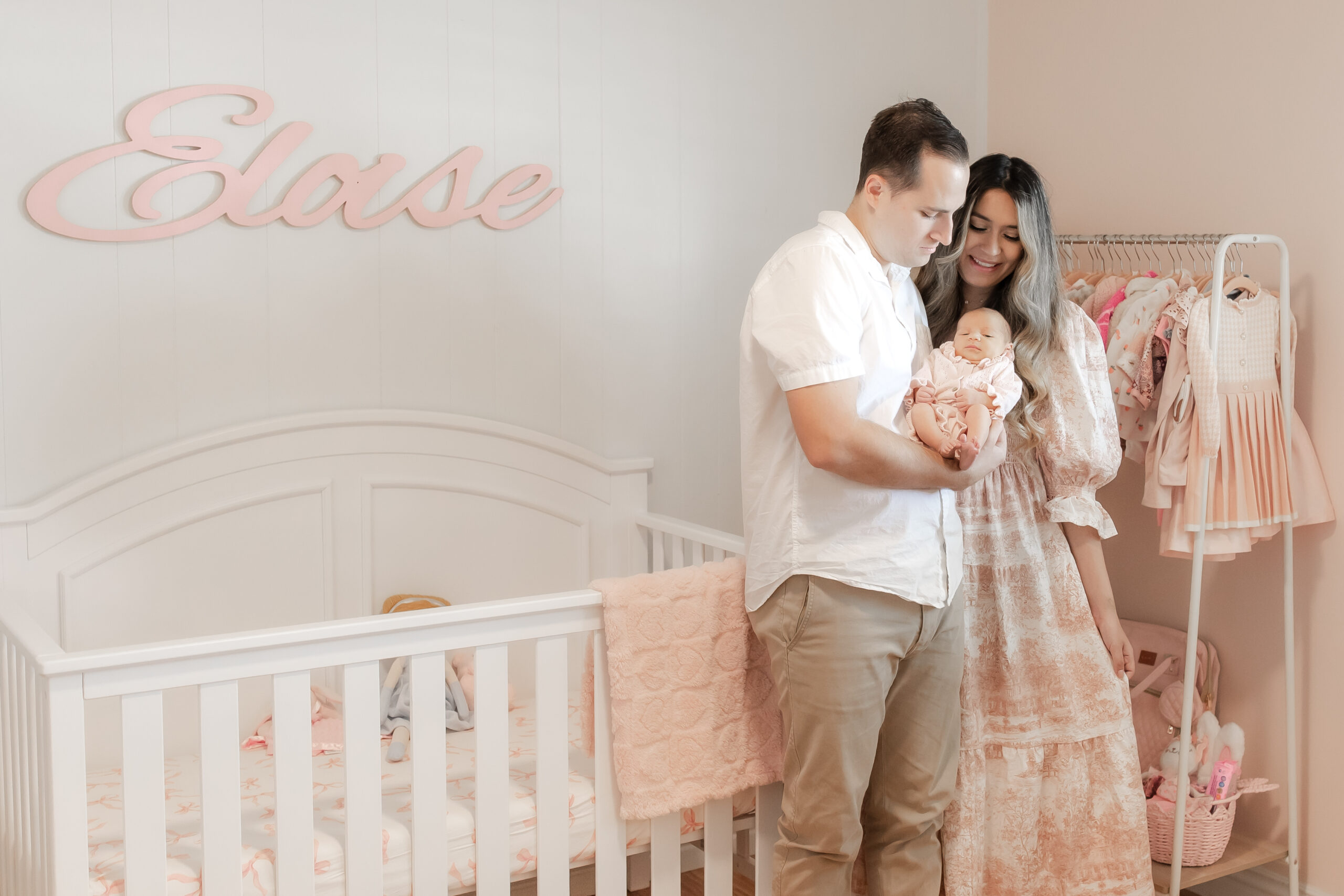 Newport beach newborn photographer family bed portrait.jpg