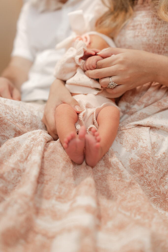 Newport beach newborn photographer mother holding baby.jpg